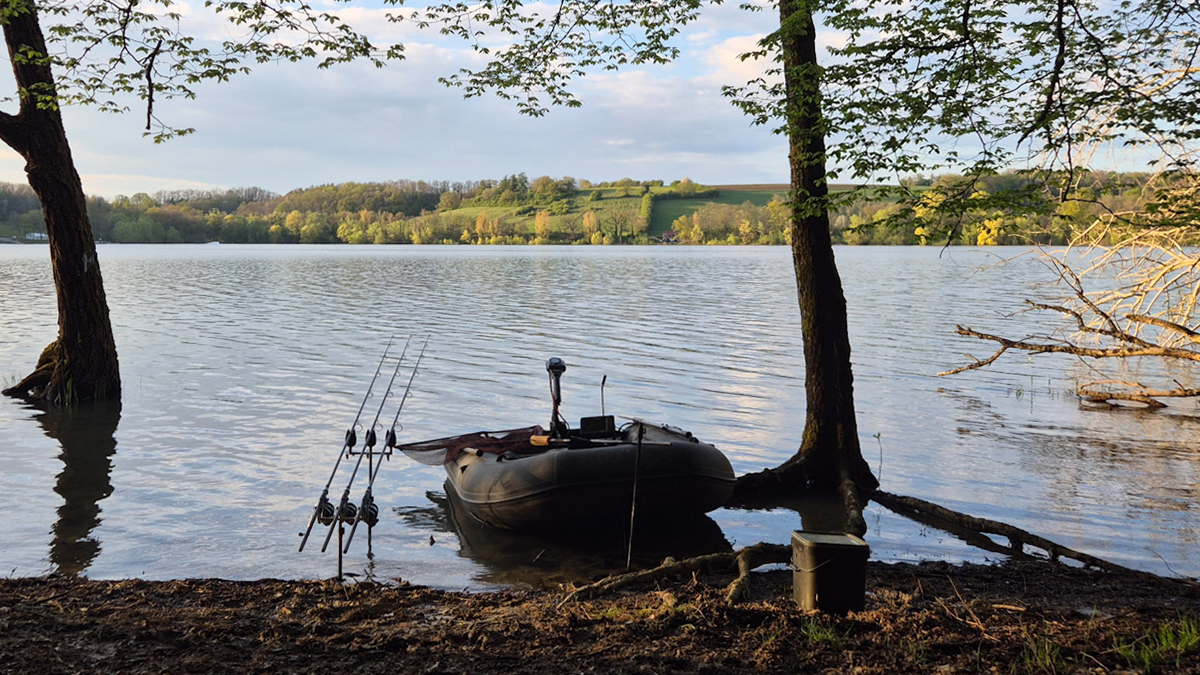 Inflatable fishing boat on a French public lake